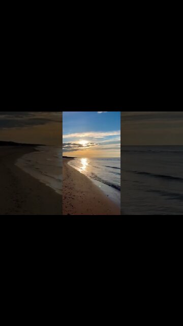 Sun reflecting off the waves on the beach