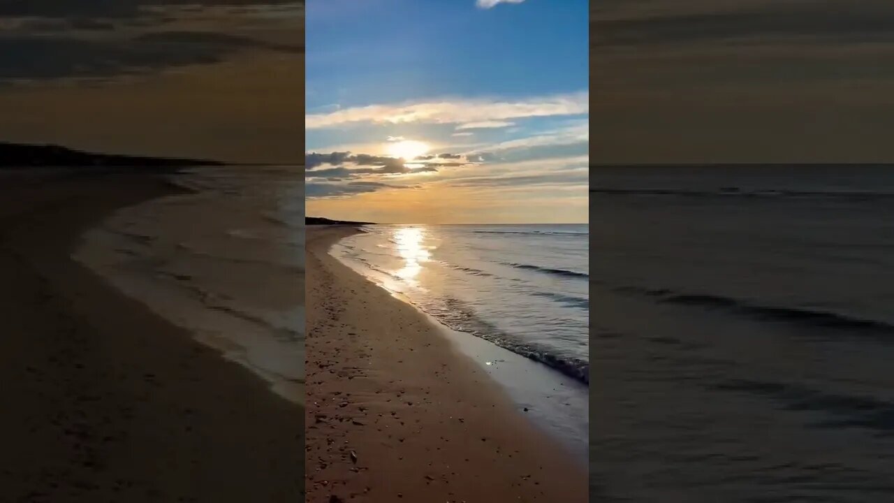 Sun reflecting off the waves on the beach