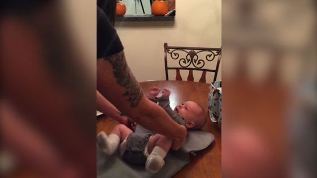 A Baby Being Tickled Gets The Last Laugh On His Parents