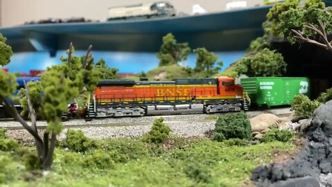 N Scale BNSF mixed train leaving the pass