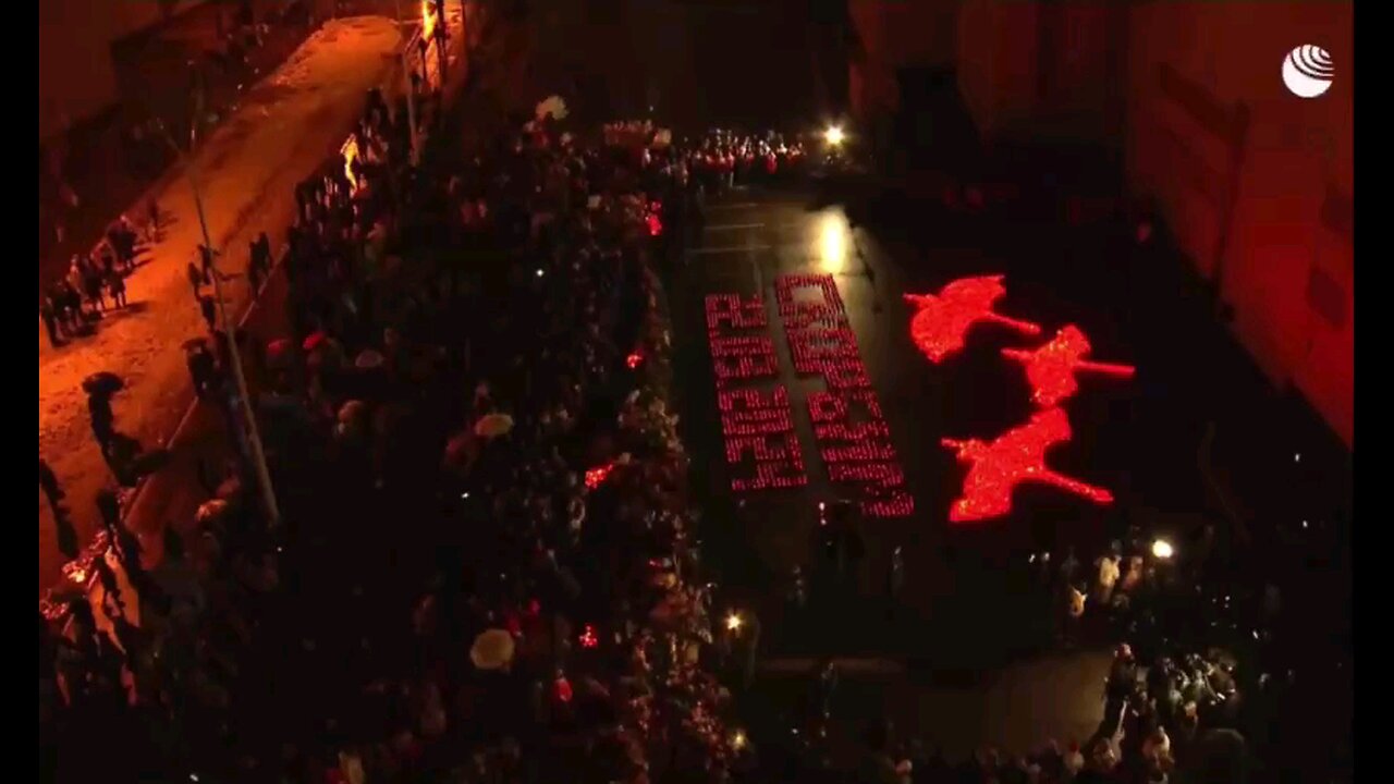 A projection of “The Cranes Are Flying” is being shown on the walls of Crocus City Hall in memory