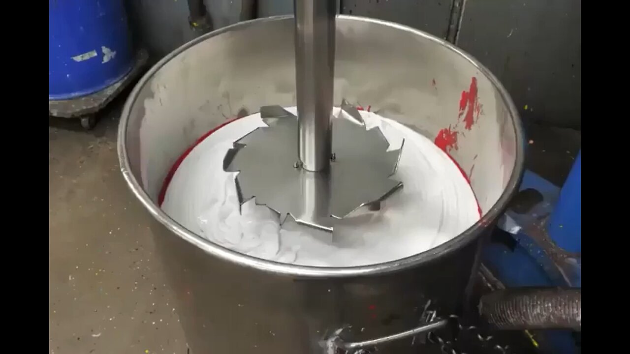 👍Red paint being mixed