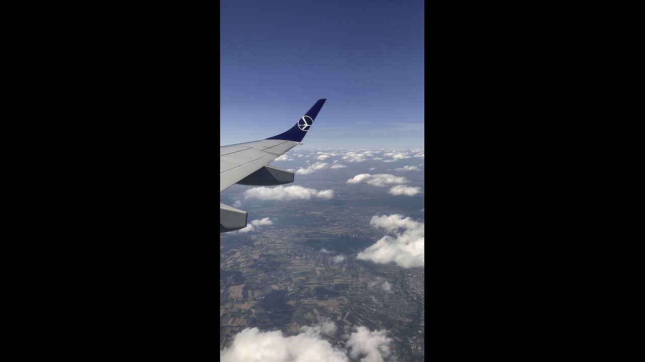 Polish LOT Airlines Floating Over Poland's Cotton Candy Clouds!