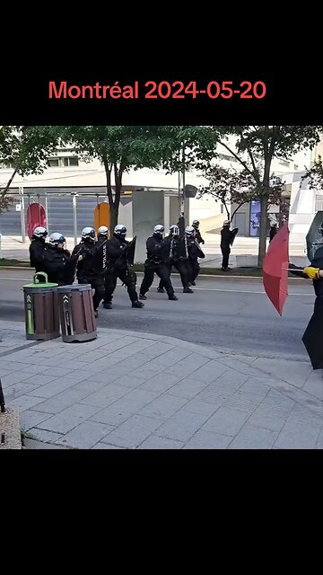 Riot police push back pro-Hamas protestors in Montreal Canada.