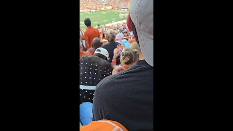 A toddler was spotted drinking a Michelob ULTRA at the University of Texas football game