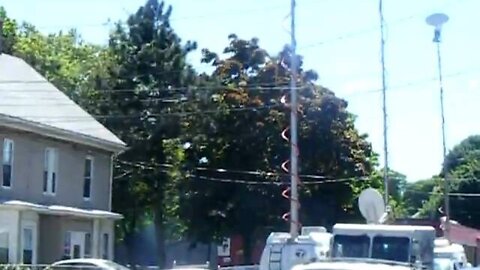 Another pan of the neighborhood and the reporters.AVI