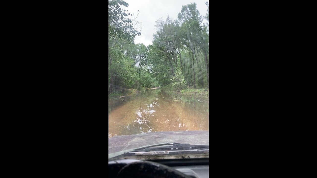 Suzuki Samurai water crossing in the Mississippi Delta