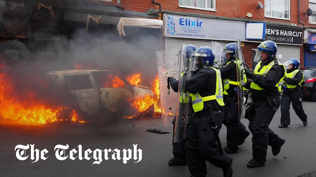 Rioters set fire to cars and clash with police over Southport stabbings | NE