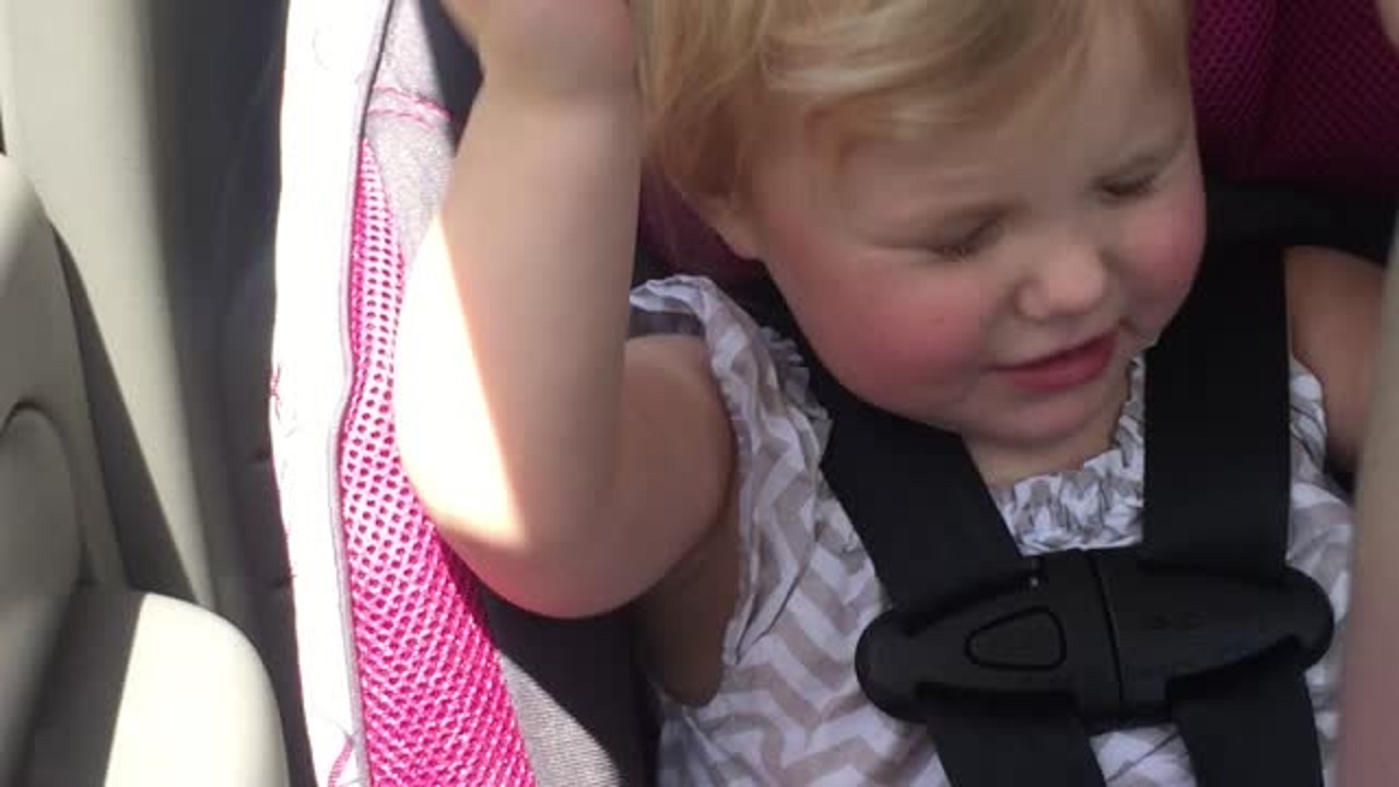 Gorgeous Little Girl Is Enjoying Her Favorite Song While Singing And Dancing