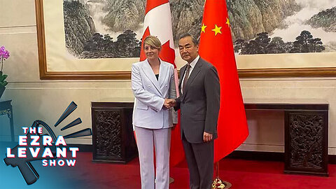 Tensions simmering as Joly makes surprise visit to China