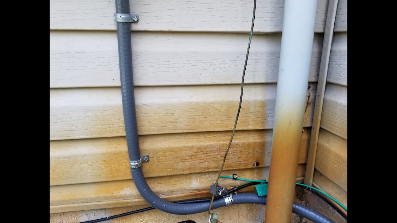 Rust stains cleaned off vinyl siding experiment step 1