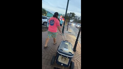 Walking through downtown Sarasota, Florida with our speaker cooler