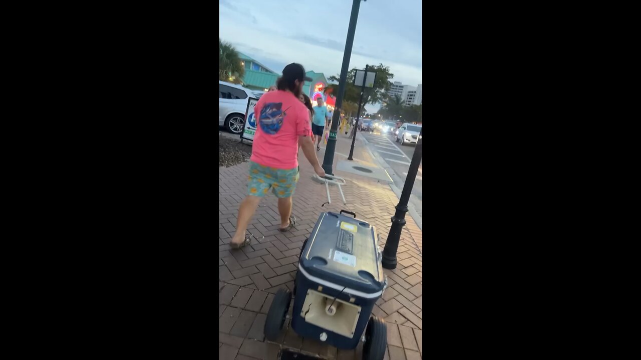 Walking through downtown Sarasota, Florida with our speaker cooler