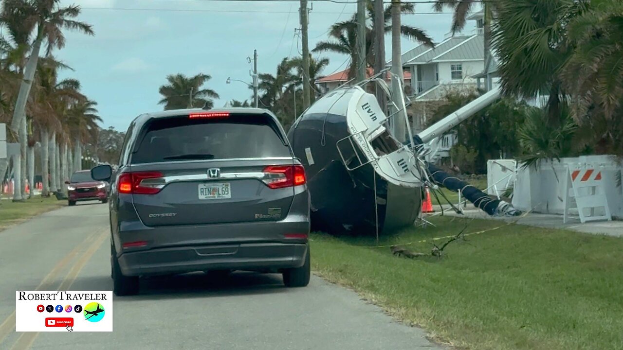 Flood waters inundated a neighborhood in Punta Gorda and smashed and capsized boats in its marina.