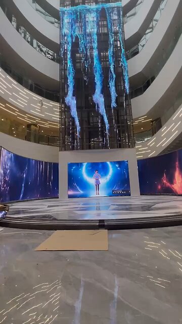 Mall Glass Elevator Turn Into A Video Screen