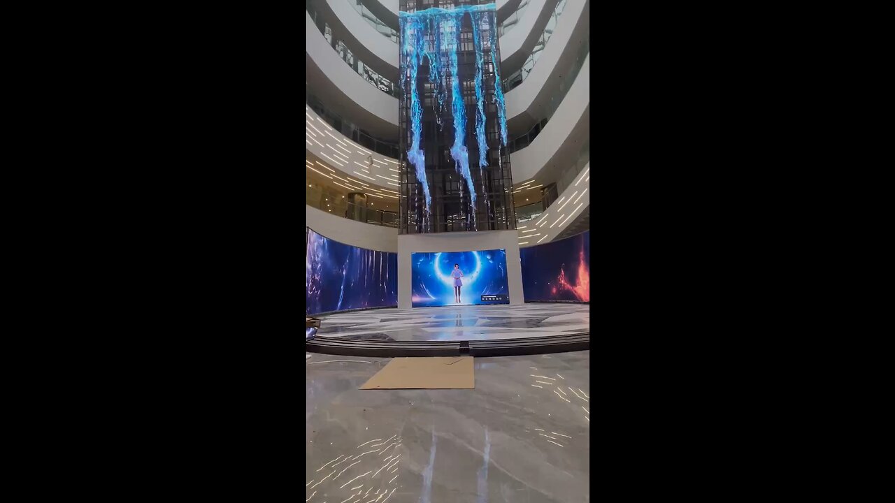 Mall Glass Elevator Turn Into A Video Screen