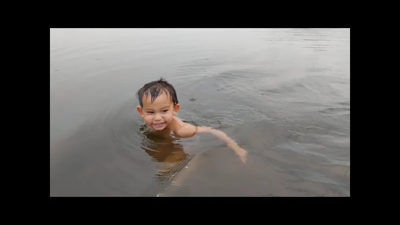 playing at a beautiful hidden thailand reservoir