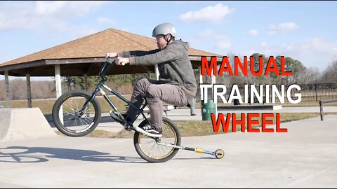 *** THE MANUAL TRAINING WHEEL ***