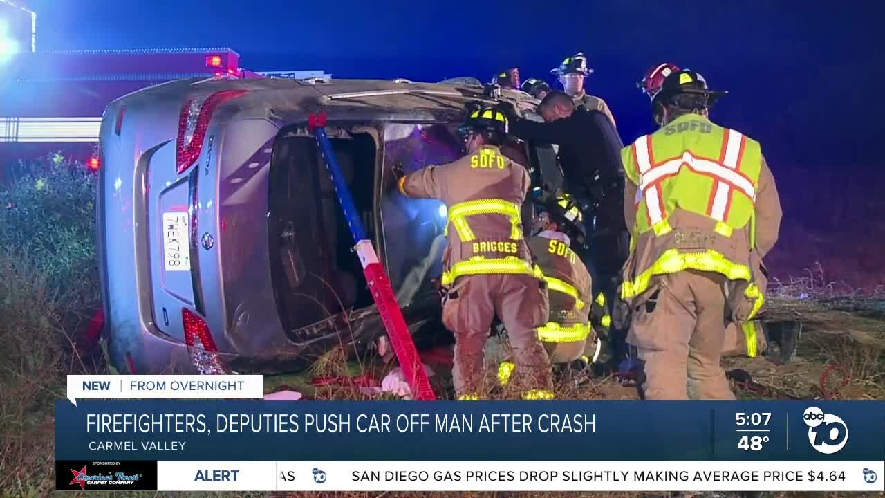 Man trapped under car after pursuit ends in crash