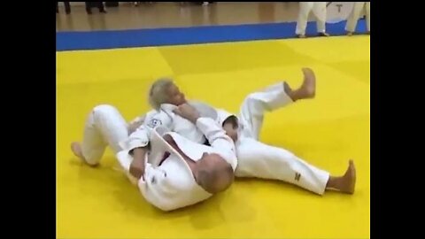 Putin Spars With Russian Judo Team.