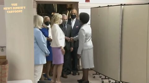 Science: Dr. Jill and Dr. Fauci are wearing masks but shaking hands at vaccination site in Harlem.