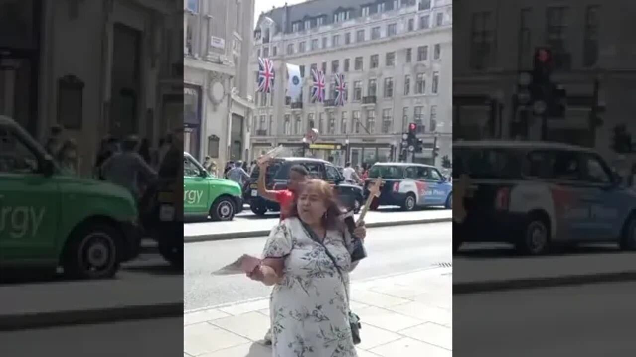 Brother Leon preaching the gospel in Oxford circus, London.