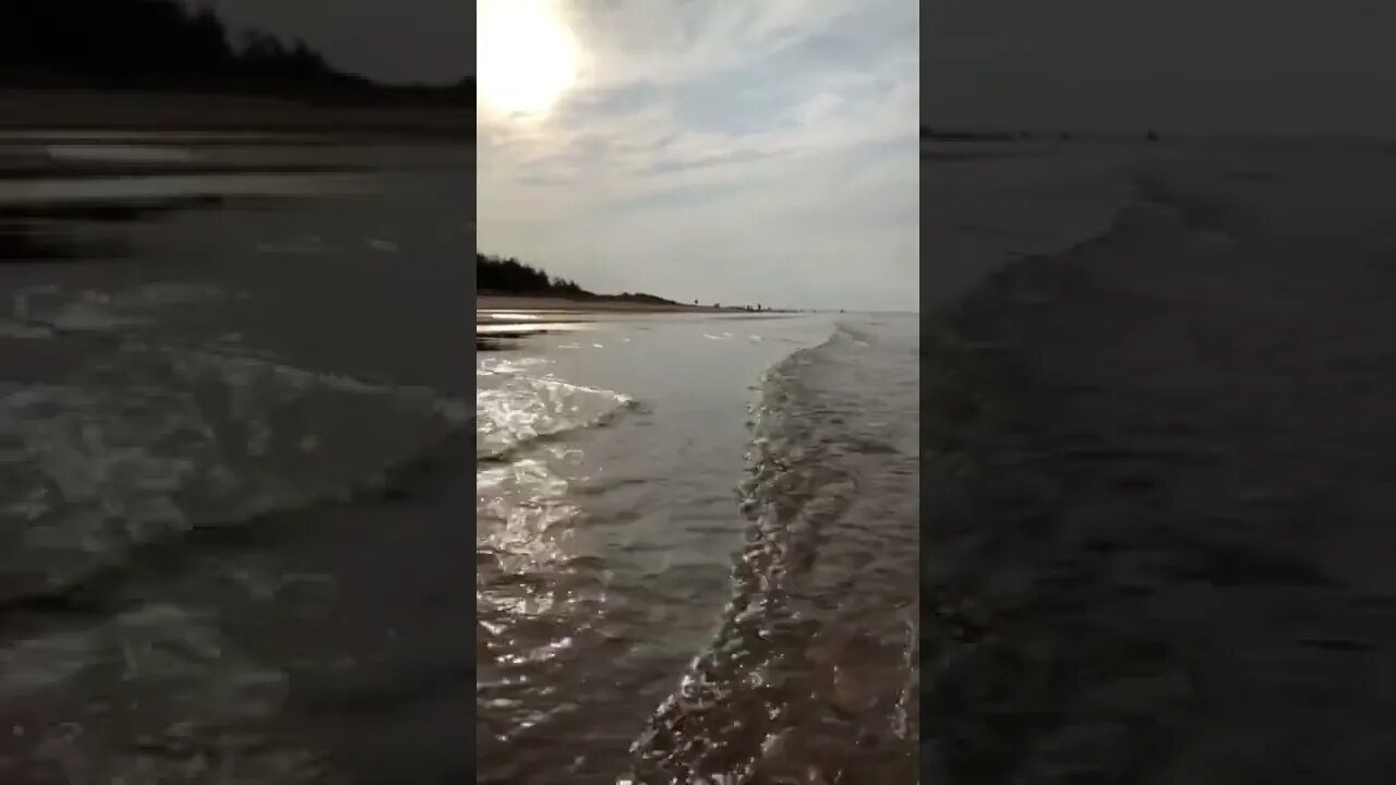 Waves rolling on the beach