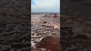 Watching the waves crash on the rocks