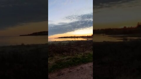 Sun setting on the water