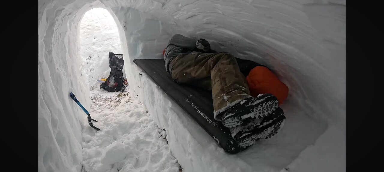 Dougout shelter under 10ft (3m) of snow-solo camping in survival shelter during snow