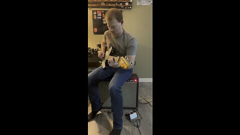 Playing some blues on the Fender American Ultra electric guitar