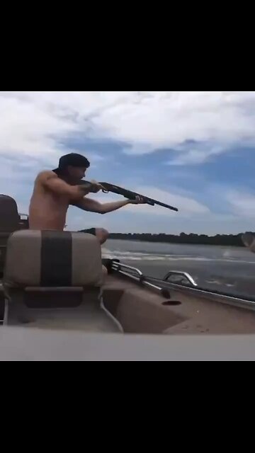 Man Goes All Out—Shoots Over Populated Fish in River with Shotgun!