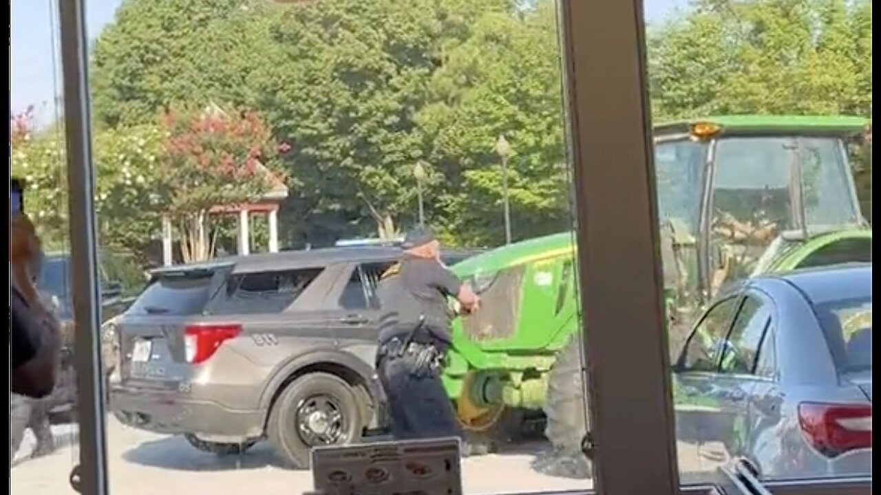 Slow-speed tractor police chase at a Waffle House.