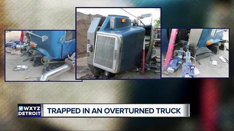 Rescue crews talk about freeing driver from overturned gravel hauler