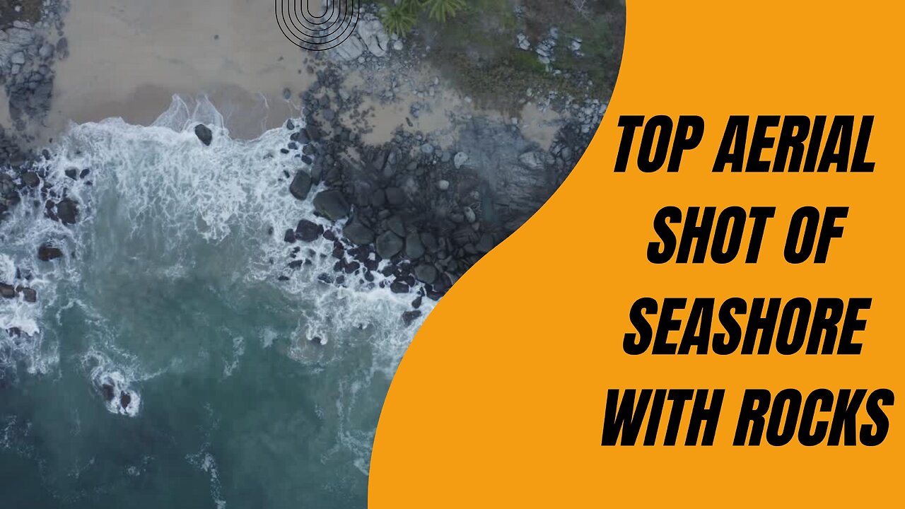 Top aerial shot of seashore with rocks