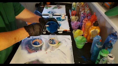 [72] 3 traveling cups, 3 canvases, and one marble
