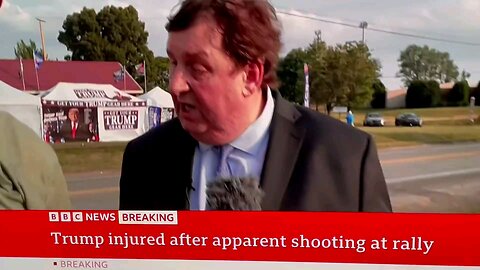 Witness saw a man army crawling on top of a roof adjacent to Trump's rally with a firearm.