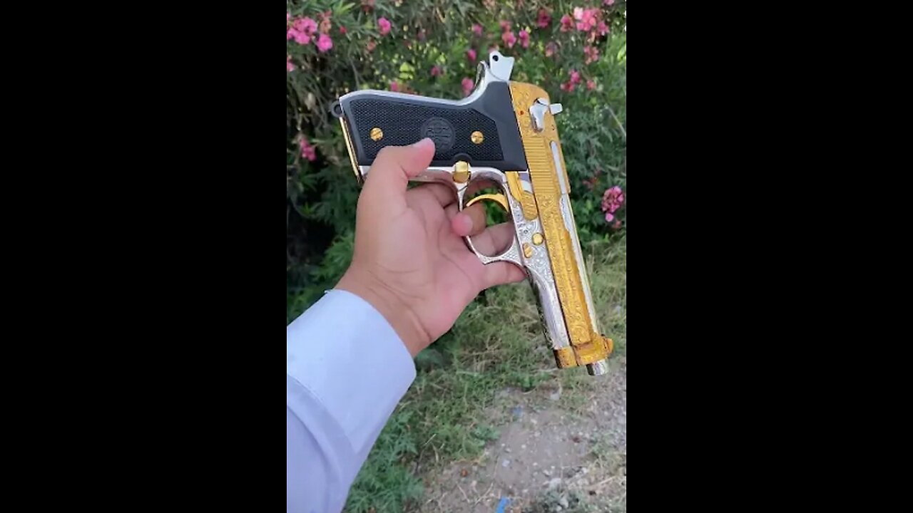 Beretta gold and silver color pistol review watch