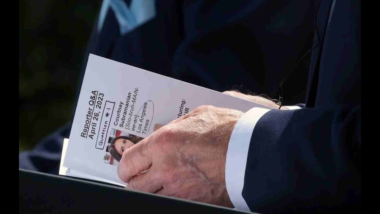 Biden Caught With Crib Notes Detailing Reporter’s Question Prior to Calling on Her