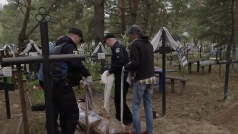 War Crime Watchdogs Investigate Atrocities, Exhume Bodies In Ivankiv