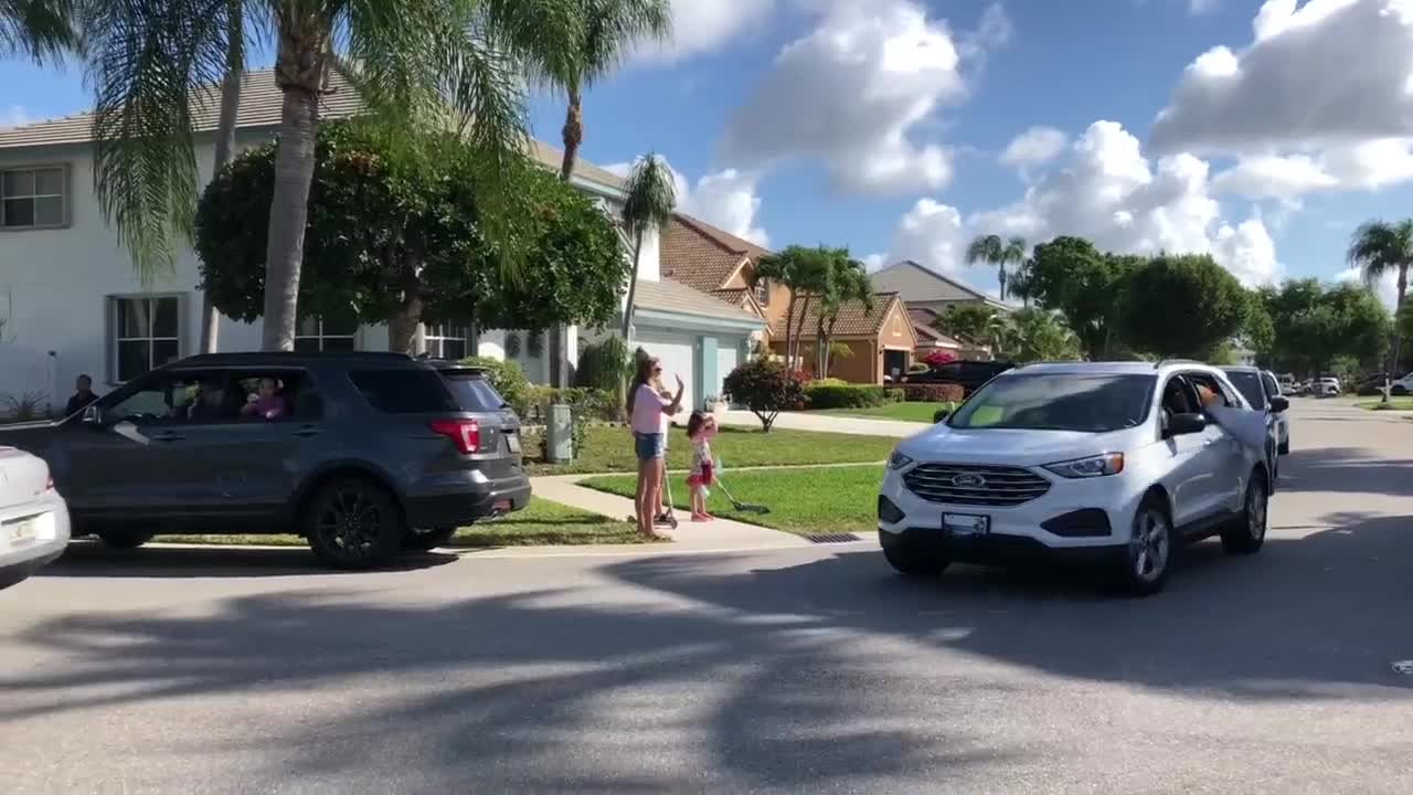 Crystal Lakes Elementary School teachers parade through neighborhoods