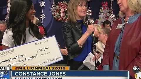 Elevate Foundation presents check to Feeding San Diego