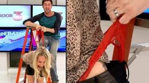 HOT HOST GETS PAINFUL WEDGIE IN LIVE SHOW