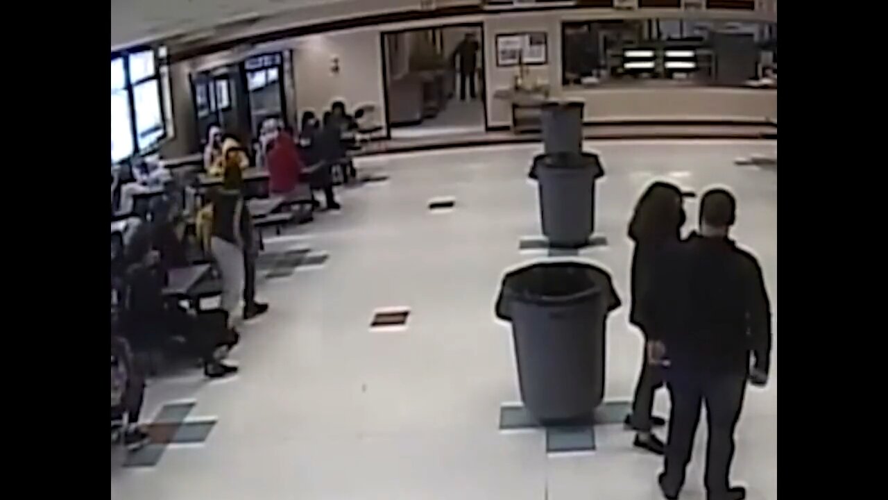Surveillance video Kenosha cop Shawn Guetschow pinning a 12yro girl down with his knee on her neck