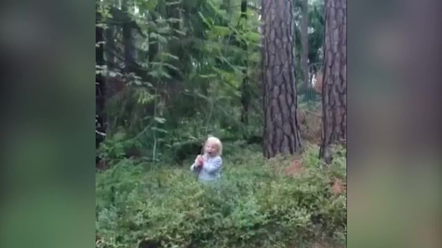 Tot Girl Knocks Down A Small Tree