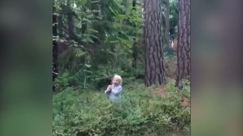 Tot Girl Knocks Down A Small Tree
