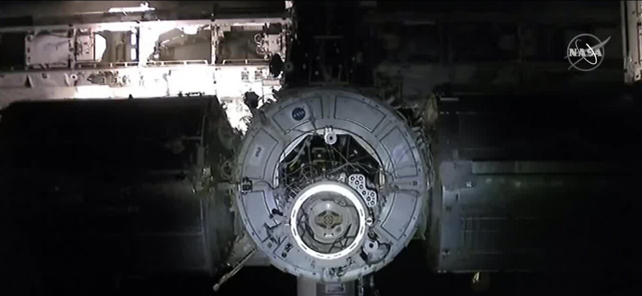 Astronauts dock at International Space Station