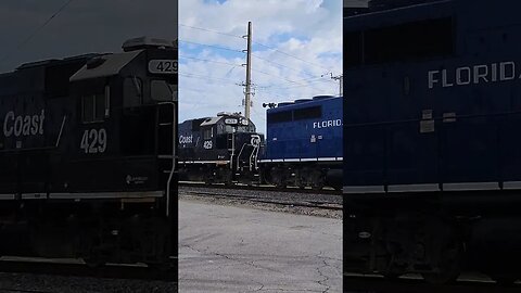 Florida East Coast Railway Southbound with some Blue at MP 112 South Daytona Apr. 25 2023 #fec