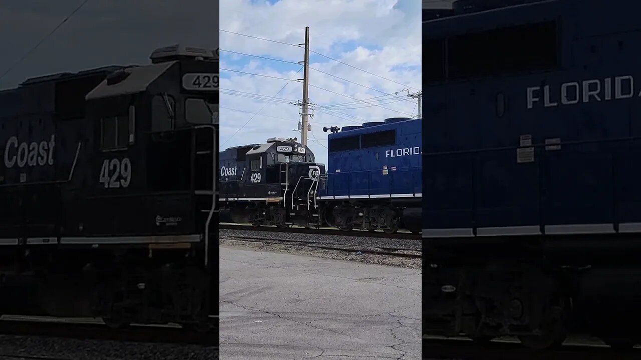 Florida East Coast Railway Southbound with some Blue at MP 112 South Daytona Apr. 25 2023 #fec