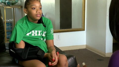 11-year-old Shamariona McCloud tries to make sense of north side shooting